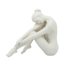 10.5x4.5x9" Seated Stone and Resin Woman Figurine
