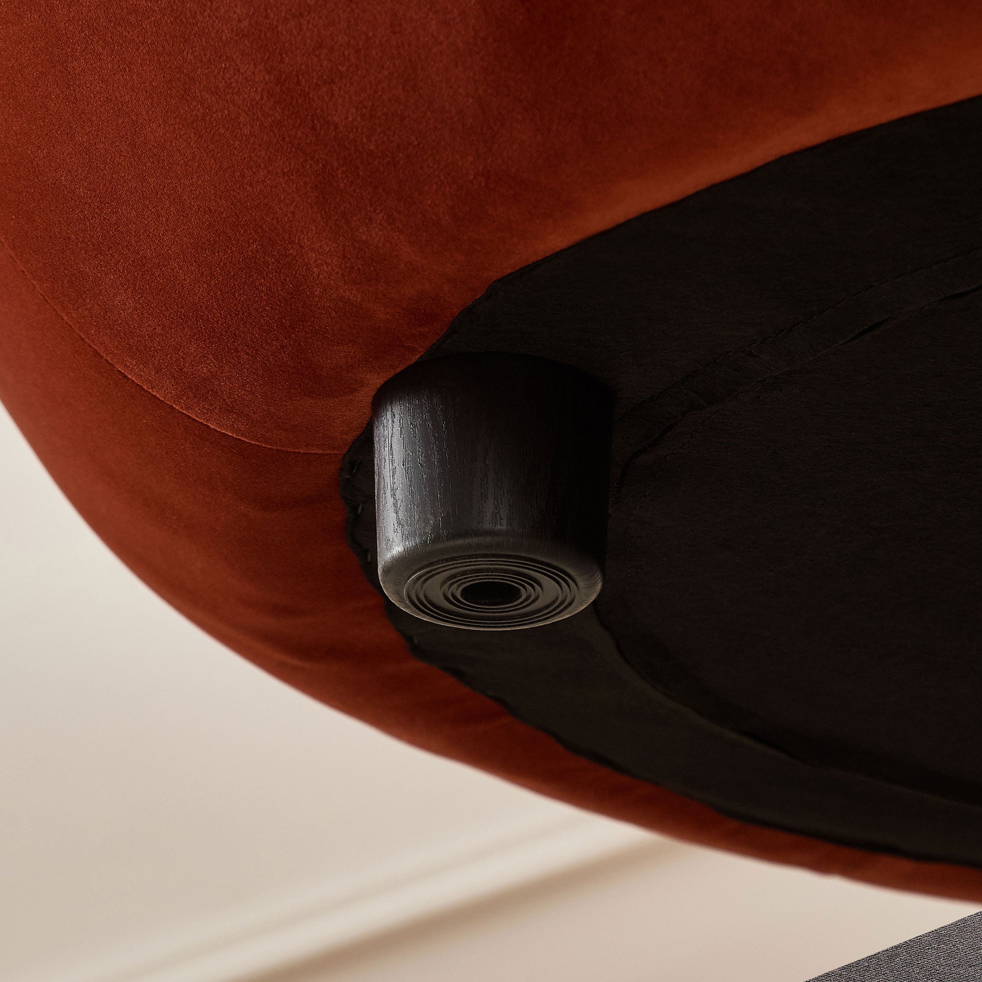 Modern Curved Sofa with Elegant Crescent Silhouette in Orange-Red