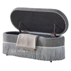 Oval Upholstered Storage Ottoman with Fringe Trim & Lift-Top Lid