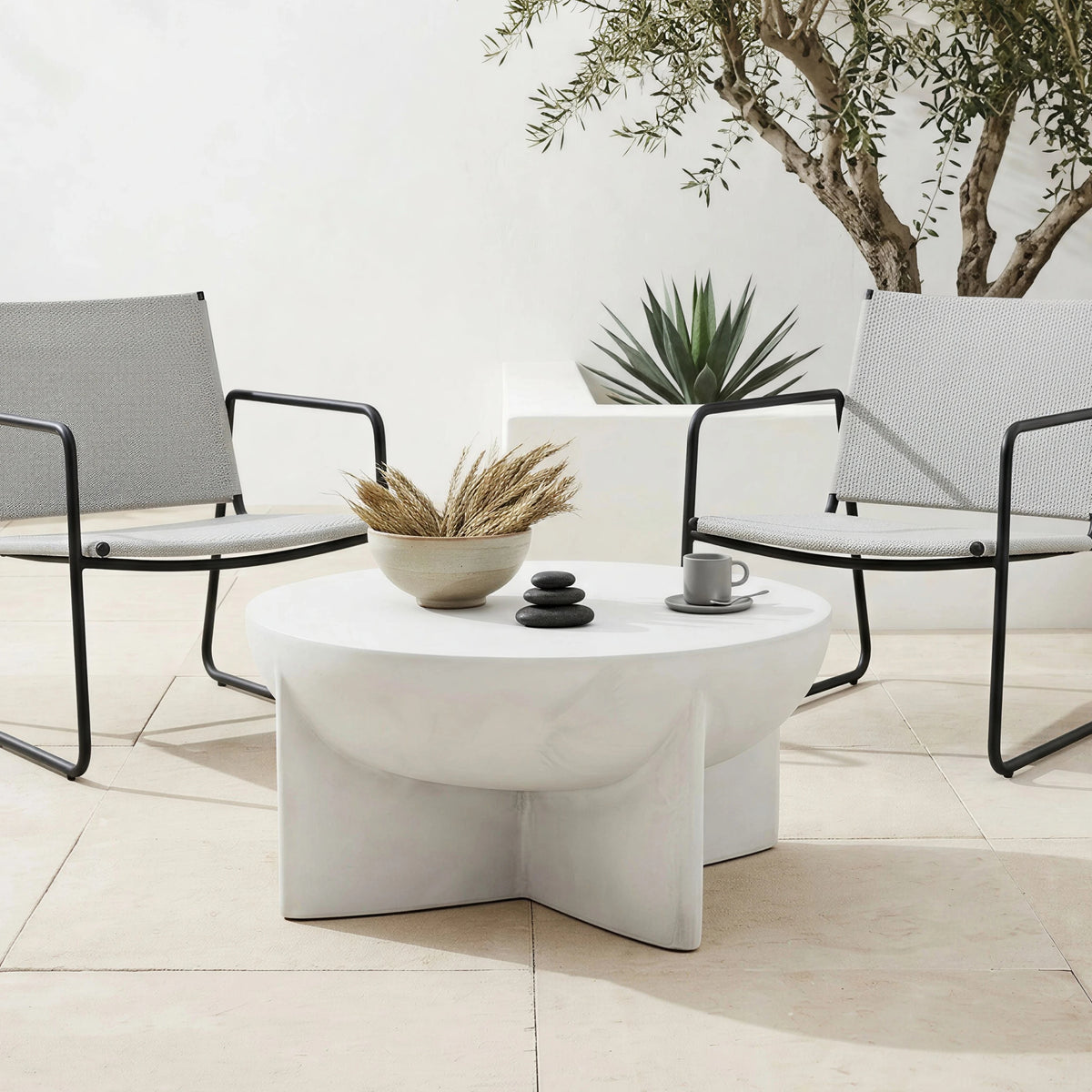 Matte White Distressed Round Coffee Table, Magnesium Oxide Sculptural Tripod Base