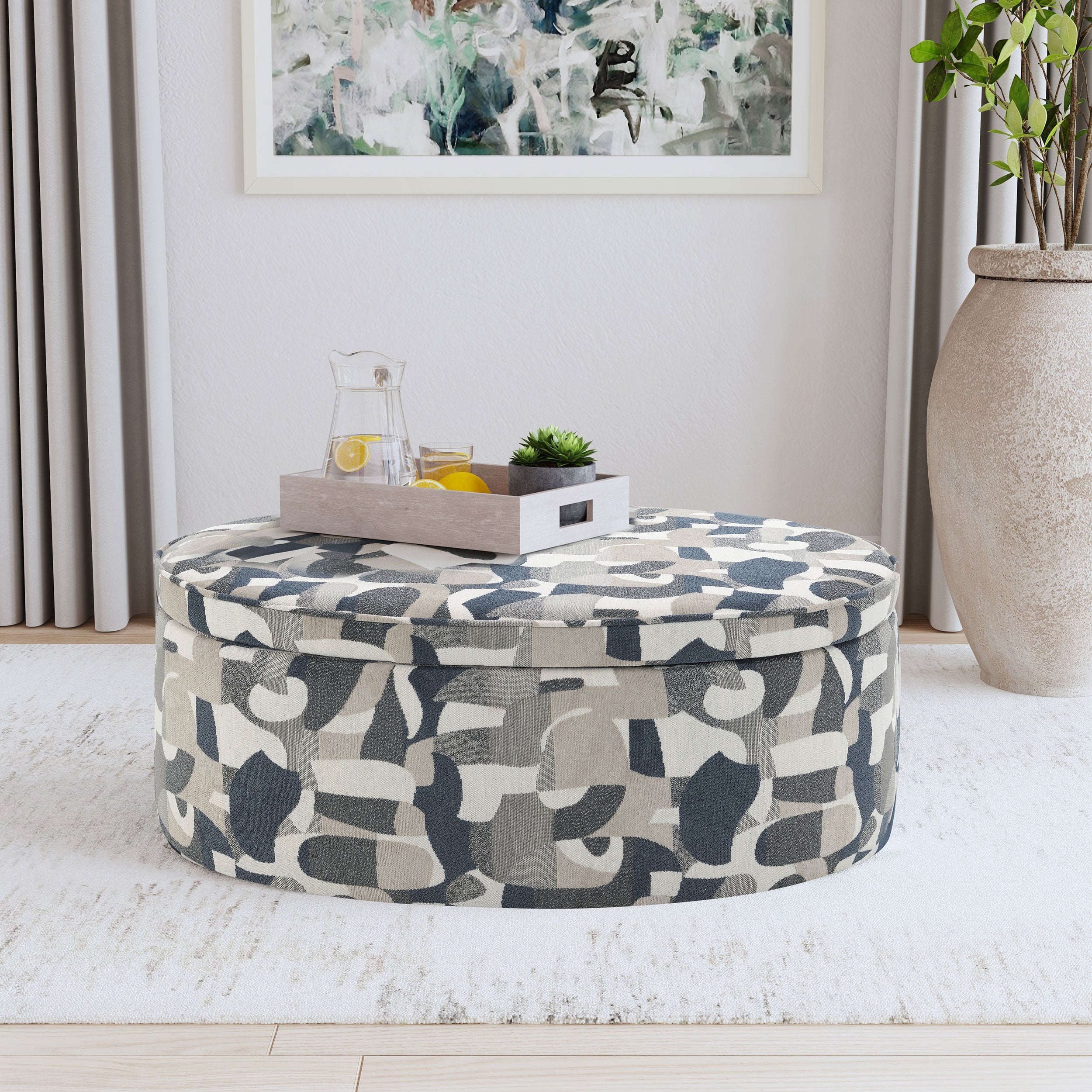 Tomkins Oval Upholstered Storage Ottoman Indigo Blue-