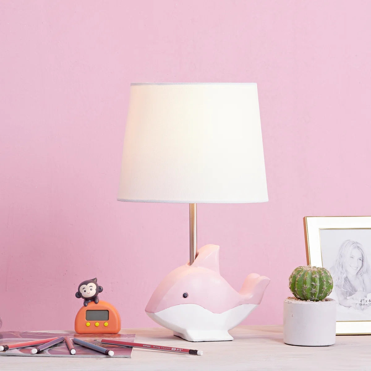 15-Inch Dolphin Resin Table Lamp, Pink, with White Linen Shade