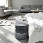 Oval Upholstered Storage Ottoman with Fringe Trim & Lift-Top Lid