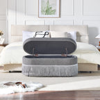 Oval Upholstered Storage Ottoman with Fringe Trim & Lift-Top Lid