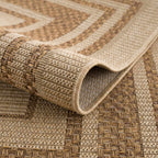 Isoko Bordered Faux Jute Outdoor Rug