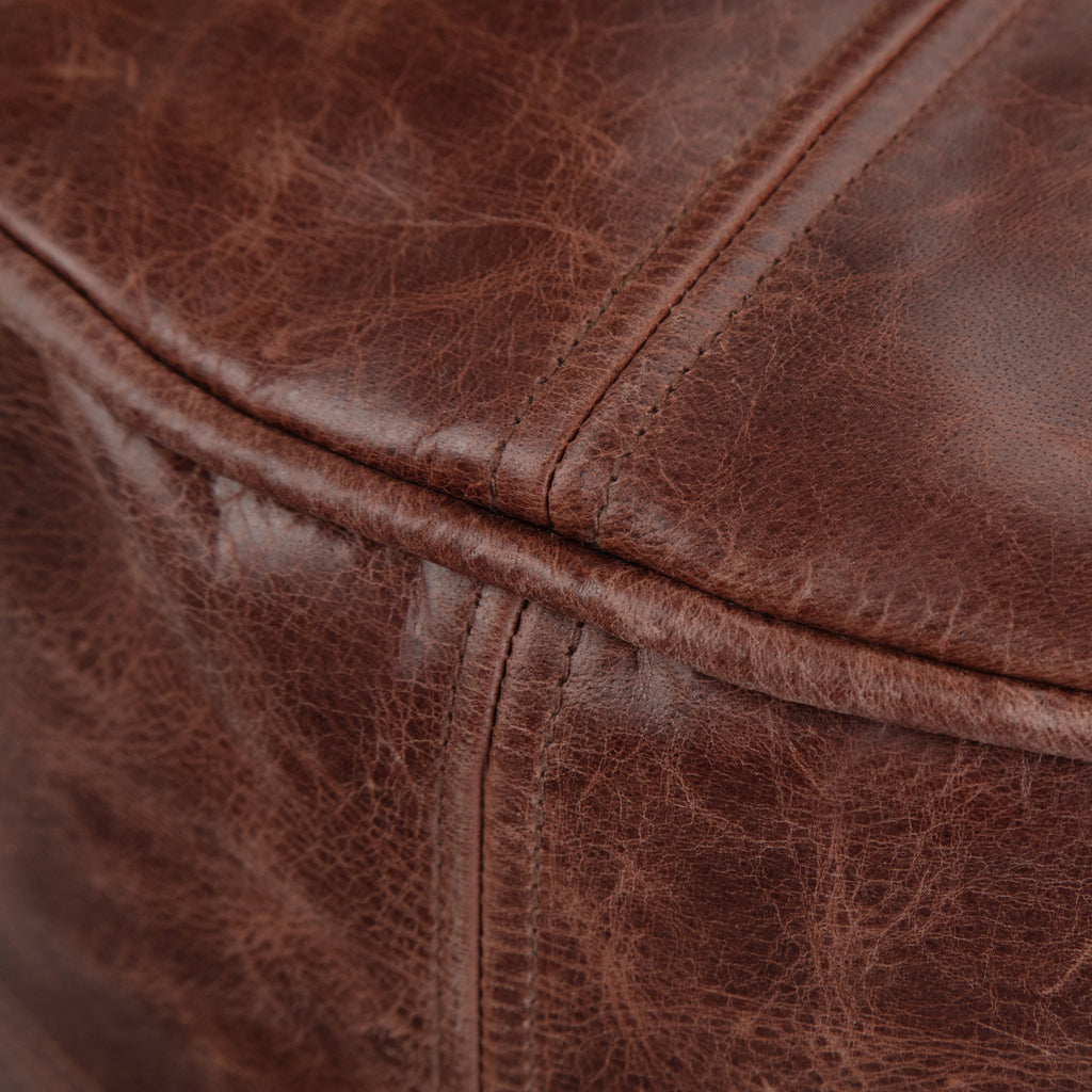 Connor 18 Inch Wide Round Pouf in Distressed