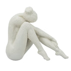 10.5x4.5x9" Seated Stone and Resin Woman Figurine