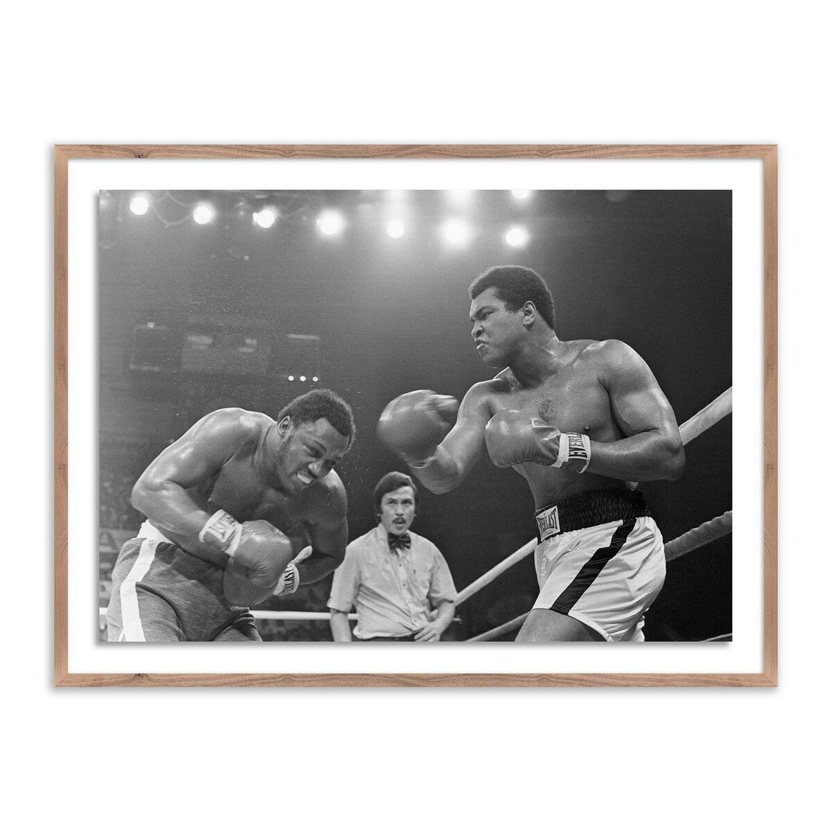 Muhammad Ali Punching Joe Frazier By Getty Images