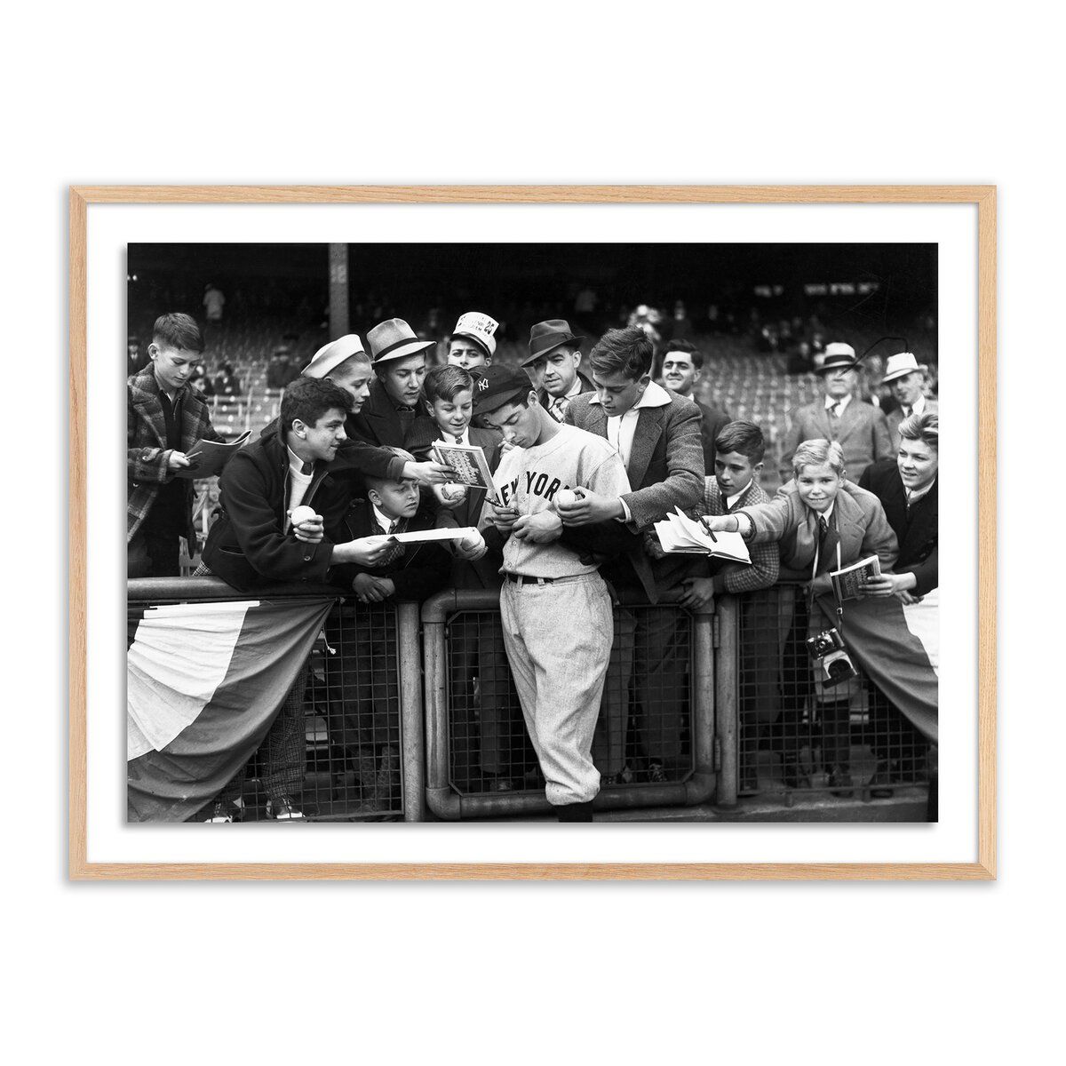 Joe Dimaggio Signing Autotgraphs By Getty Images
