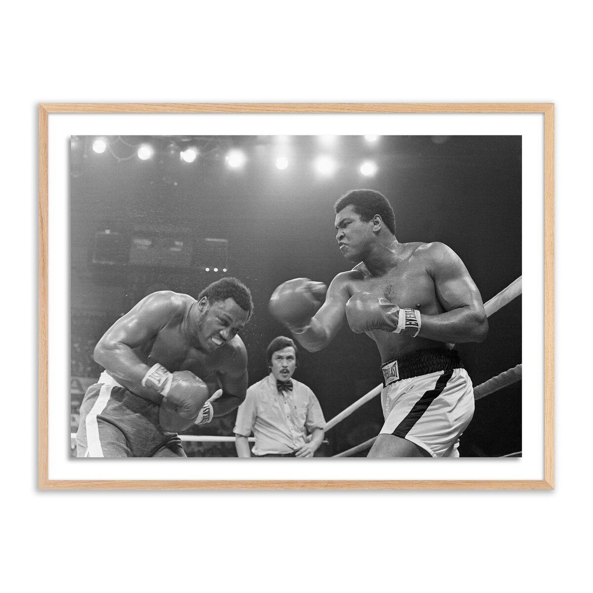 Muhammad Ali Punching Joe Frazier By Getty Images