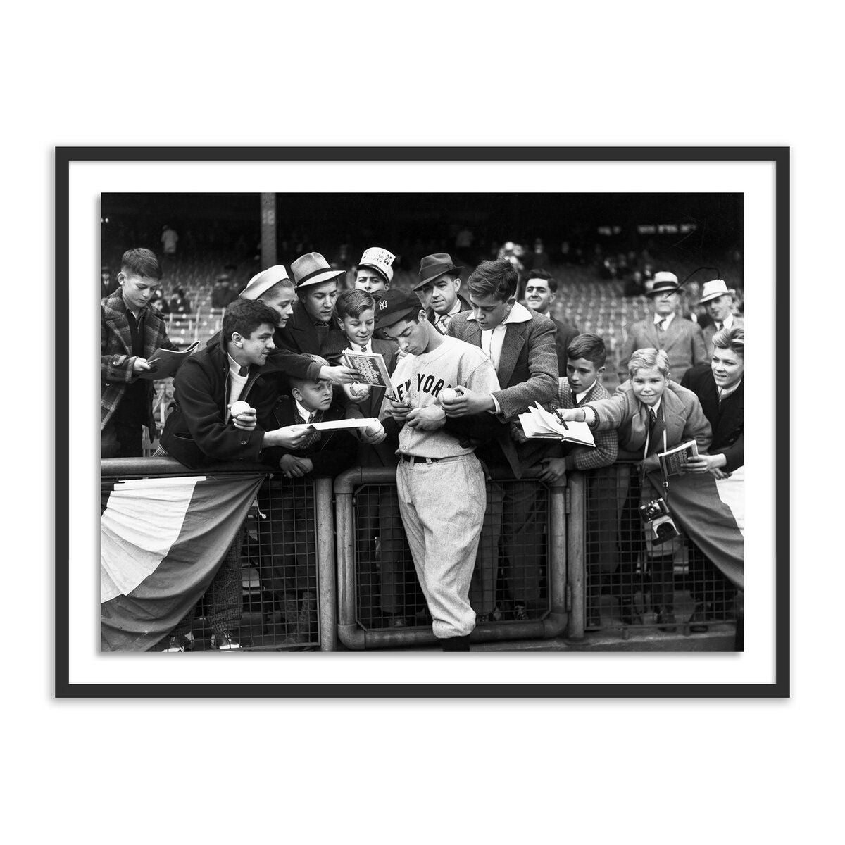 Joe Dimaggio Signing Autotgraphs By Getty Images