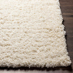 Siari Solid Cream Plush Rug