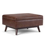 Owen 34 Inch Wide Coffee Table Storage Ottoman in Distressed Saddle