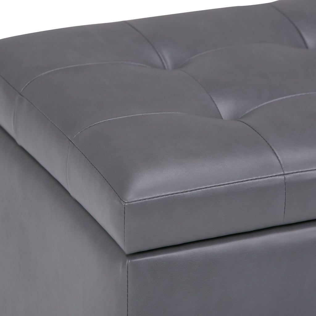 Cosmopolitan 34 Inch Wide Storage Ottoman in Stone